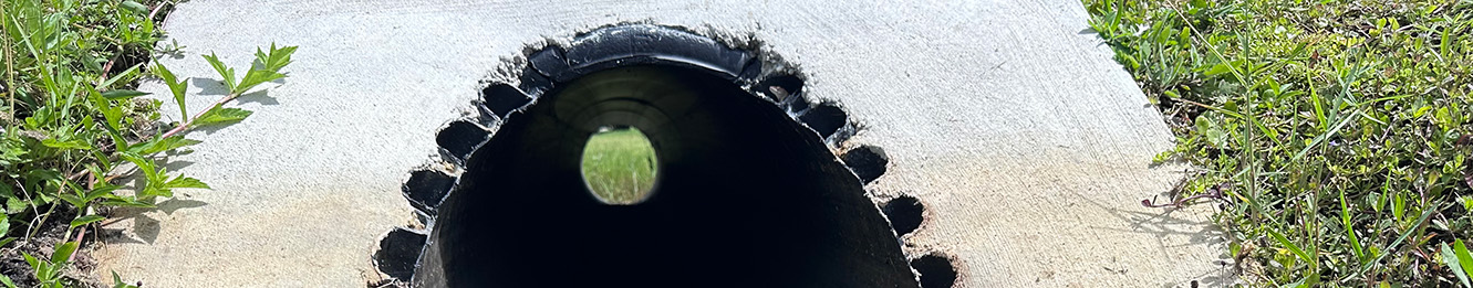 Looking through a clean culvert pipe